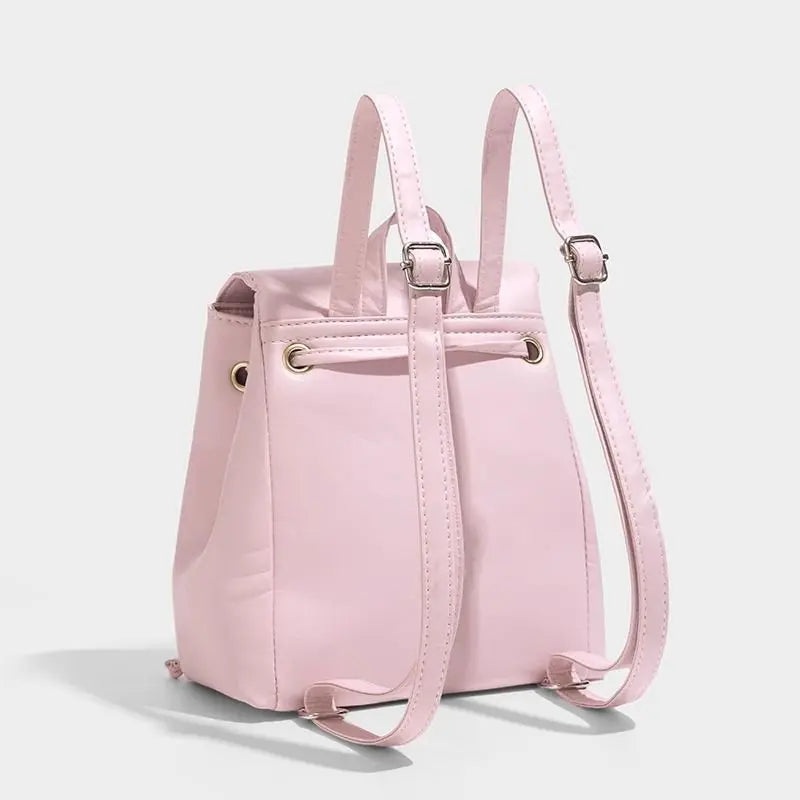 Small Pink Backpack with Embroidered Design and Drawstring Closure