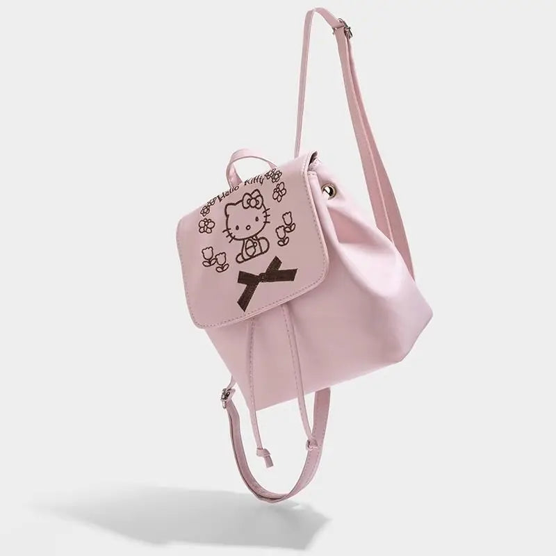 Small Pink Backpack with Embroidered Design and Drawstring Closure