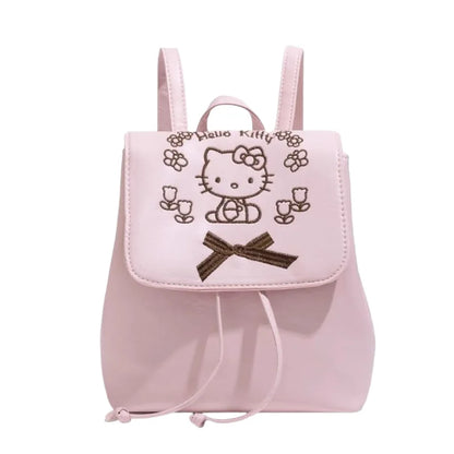 Small Pink Backpack with Embroidered Design and Drawstring Closure