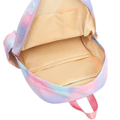 Backpack with colorful exterior and beige interior on a white background