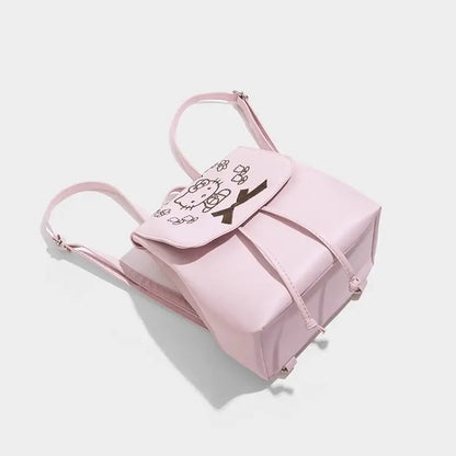 Small Pink Backpack with Embroidered Design and Drawstring Closure