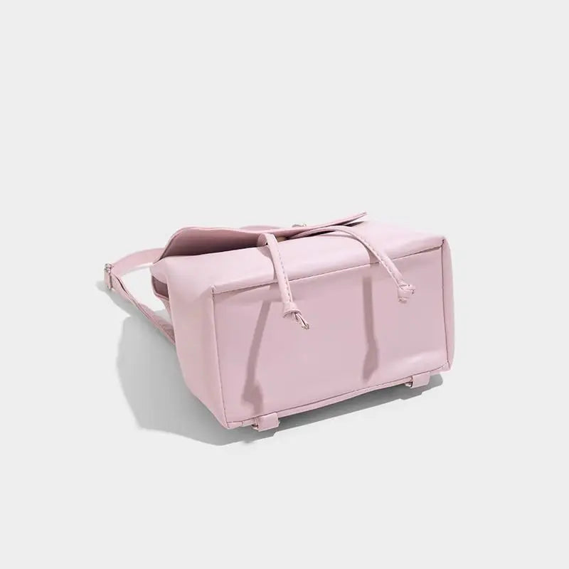 Small Pink Backpack with Embroidered Design and Drawstring Closure