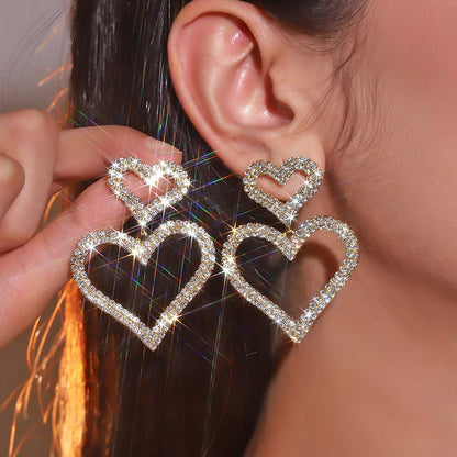 Silver Glow Double Heart Earrings